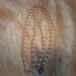 Long strand of Pearls by Chaps